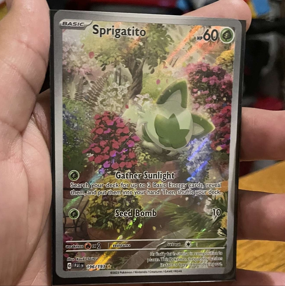 Graceful Green and Black Reptile with Striking Features (Sprigatito)